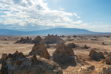 large formation of rocks in desert on sunny day, high definition photo