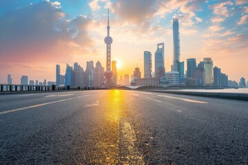 Obraz premium Asphalt road and bridge with city skyline in Shanghai at sunset China. 