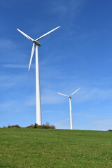 Fototapeta premium Wind power plants in forests and woodlands in Hesse