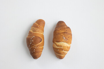 Salted bread on white background.