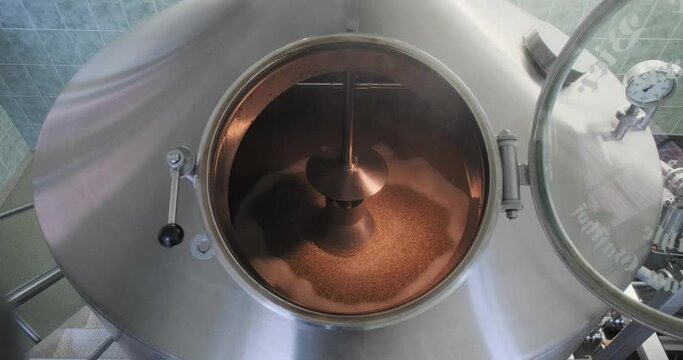 Top view into the mash tank during the mashing process at a brewery production site
