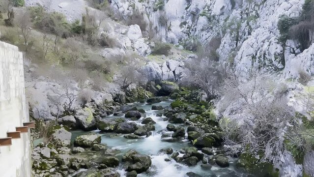 Ljuta River flowing on rocks between mountains near Donji Orahovac village, Kotor, Montenegro
