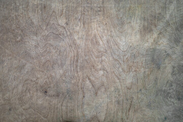 cracked and weathered gray plywood texture background.
