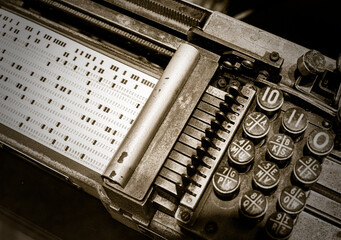 the keys are missing on the typewriters keyboard and its case is open