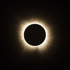 Total solar eclipse with moon visible in the sky