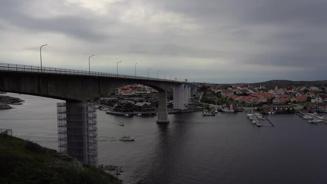 View of Smogen Bridge and Smogen Island as seen from Kungshamn city on a cloudy day, Sweden