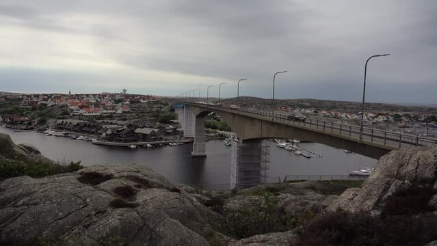 View of Smogen Bridge and Smogen Island as seen from Kungshamn city on a cloudy day, Sweden