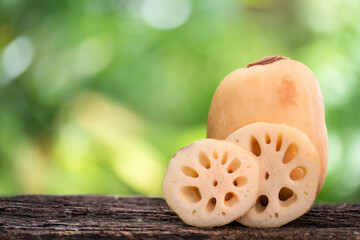 Fresh lotus roots and slices on natural background.