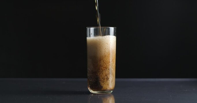 Cola soda can pouring in glass slow-motion, 4k prores