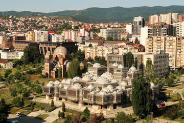 View from the bell tower of the Cathedral of Saint, St. Mother Theresa onto the National University Library of Kosovo, an example of brutalist, socialist architecture, Prishtina, Pristina, Kosovo