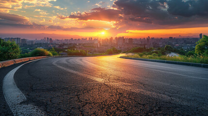 Curved asphalt road leading to urban city at sunset, a picturesque scene of urban transition.