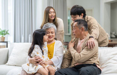 Portrait of happy love family asian father and mother playing with adorable asian kid...