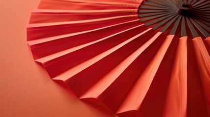 A close-up shot of a red umbrella against a wall. Perfect for advertising or weather-related designs