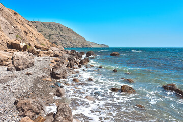 rocky shore of Black Sea, landscape with rocks on seashore, rocks sticking out of sea