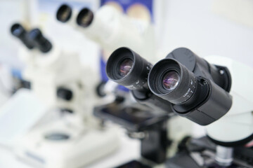 Close up of microscopes in a laboratory. Scientific research concept.
