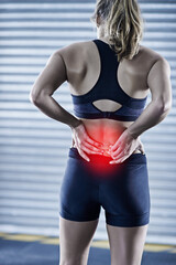 Woman, back pain and injury in outdoor, sprain and red glow for inflammation after exercise accident. Female person, backache and fibromyalgia or arthritis, sciatica and spine bruise after workout