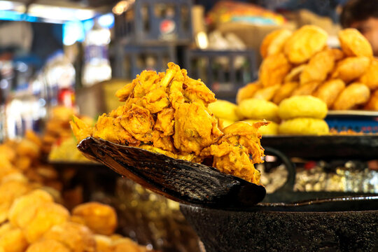Popular street food item mix bhajiya snacks or Pakoda or Pakora Alu bhajiya