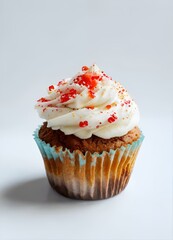 a cupcake with iceing on a white background