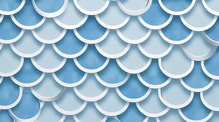 A blue and white cutout pattern with simple symmetrical fish scale design.