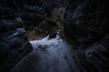 Gloomy and totally moody path lost in the foggy rocks with the best dark and mystic atmosphere in...