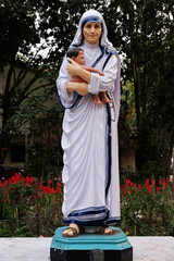 Mother Teresa statue infront of the Catholic Church in Kumrokhali, West Bengal, India