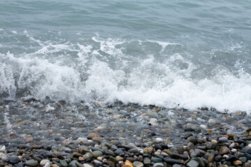Fototapeta premium Sea wave crashing on the shore