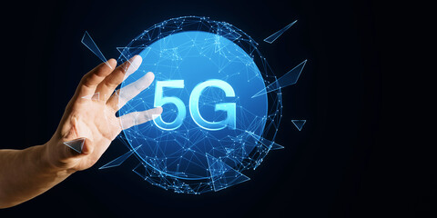 A hand interacting with a digital 5G network sphere on a dark blue background, symbolizing advanced technology