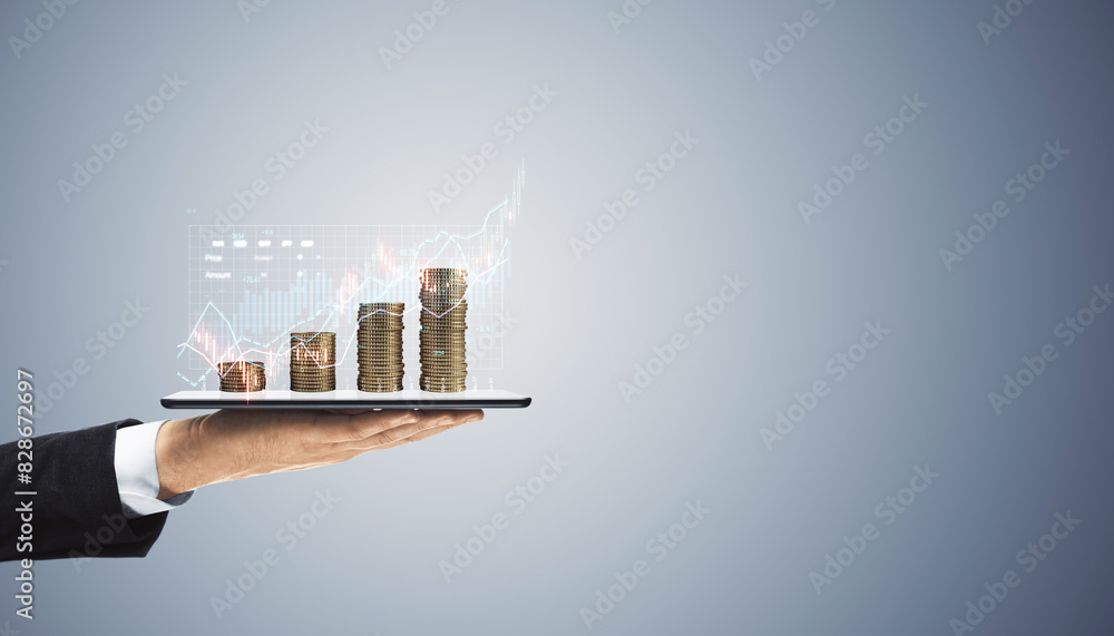 Aufkleber a hand presenting a digital tablet showing a holographic financial growth chart and stacked coins on