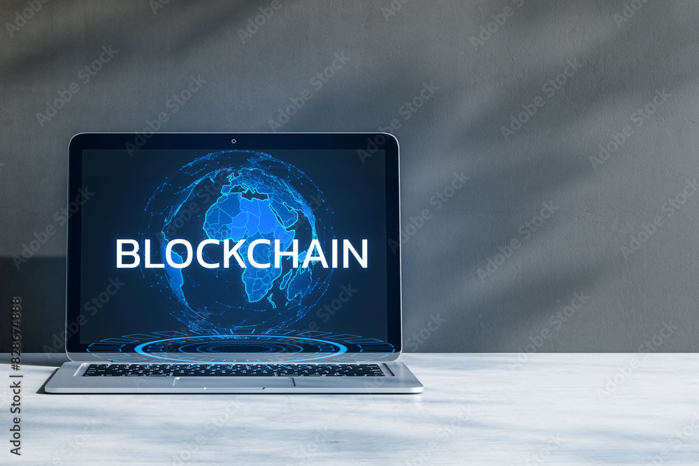 Aufkleber A laptop on a marble surface displays the word BLOCKCHAIN with a digital globe, symbolizing cryptocurrency and secure technology, on a grey background. 3D Rendering