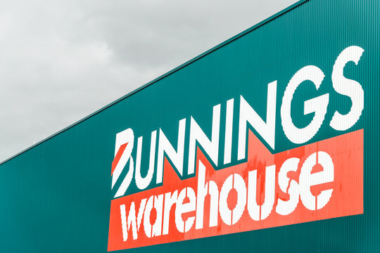 Adelaide, South Australia - October 25, 2020: Bunnings Warehouse hardware store logo on the shopping centre wall viewed form car park on a day.