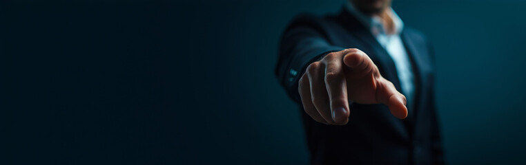 Naklejka premium Businessman pointing finger to something