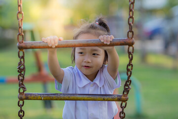 Fototapeta premium Happy asian little girls play funny on playground