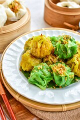 Chinese Steamed Dumpling and steamed stuff bun ,a steamed dumpling with the dough gathered at the top.shumai, morning breakfast , close up food
