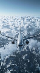 Fototapeta premium A sleek silver airplane soars through the sky above a majestic mountain range.