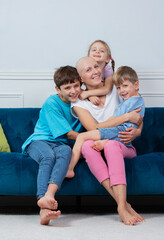 Cancer survivor middle aged smiling woman sit with her children
