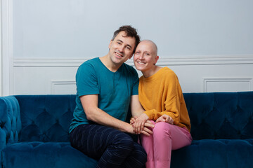 Smiling pair in a heartfelt embrace, happy about cancer recovery