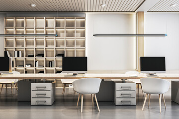 A modern office interior with desks, chairs, computers, and bookshelves on a white background, concept of a workspace. 3D Rendering © Who is Danny
