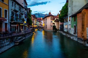 Annecy old town at night with the old prison in the middle of a lake. © lagunabluemolly