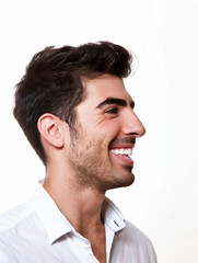 Fototapeta premium headshot of a handsome man smiling side profile facing right with a white background