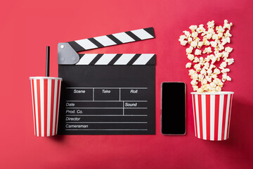 Cinema tickets online, Popcorn bucket with soda cup and Cinema clapper board with phone, mobile app...