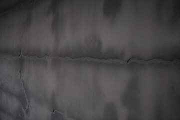 Distressed Rough Black cracked wall slate texture wall grunge backdrop rough background, dark concrete floor or old grunge background. black concrete wall , grunge stone texture background.