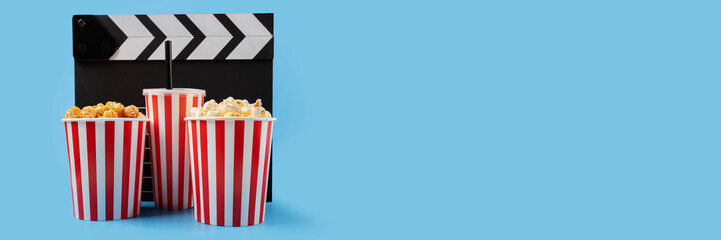 Popcorn bucket salty and caramel with soda cup and Cinema clapper board, theater snack pack, sweet...