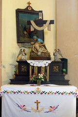 Altar of Our Lady of Sorrows in the Parish Church of the Assumption of the Virgin Mary in Kupinec,...