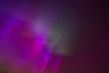 Subtile Background of Northern Lights and Stars in the Sky