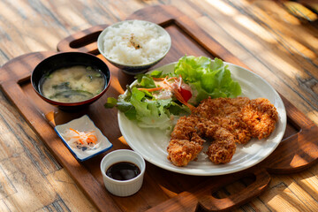 Tonkutsu set serve on wood plate.
