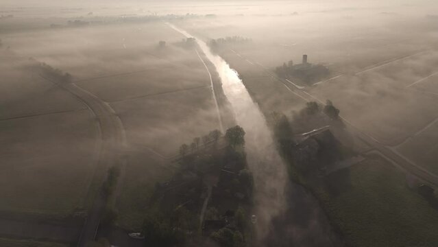 Morning Mist over Dokkumer Ee River, Friesland: Aerial View
