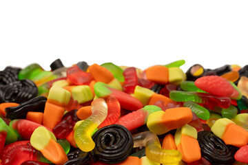 Assorted colorful gummy candies isolated on a white background. Top view.