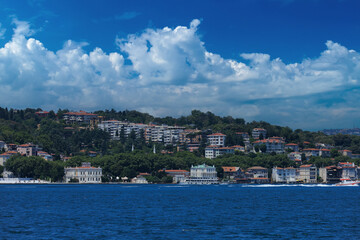 Fototapeta premium Turquoise blue sea water. View of the Bosphorus in Istanbul city on sunny summer day, in a public place.