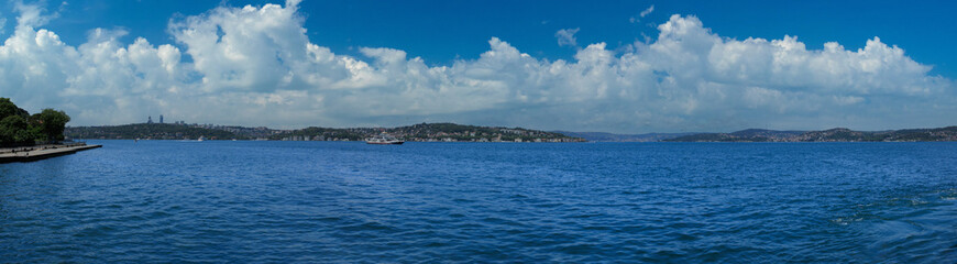 Turquoise blue sea water. View of the Bosphorus in Istanbul city on sunny summer day, in a public place.
