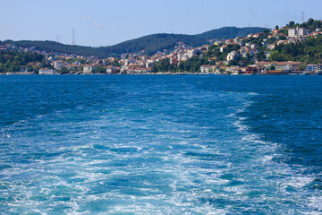 Turquoise blue sea water. View of the Bosphorus in Istanbul city on sunny summer day, in a public...